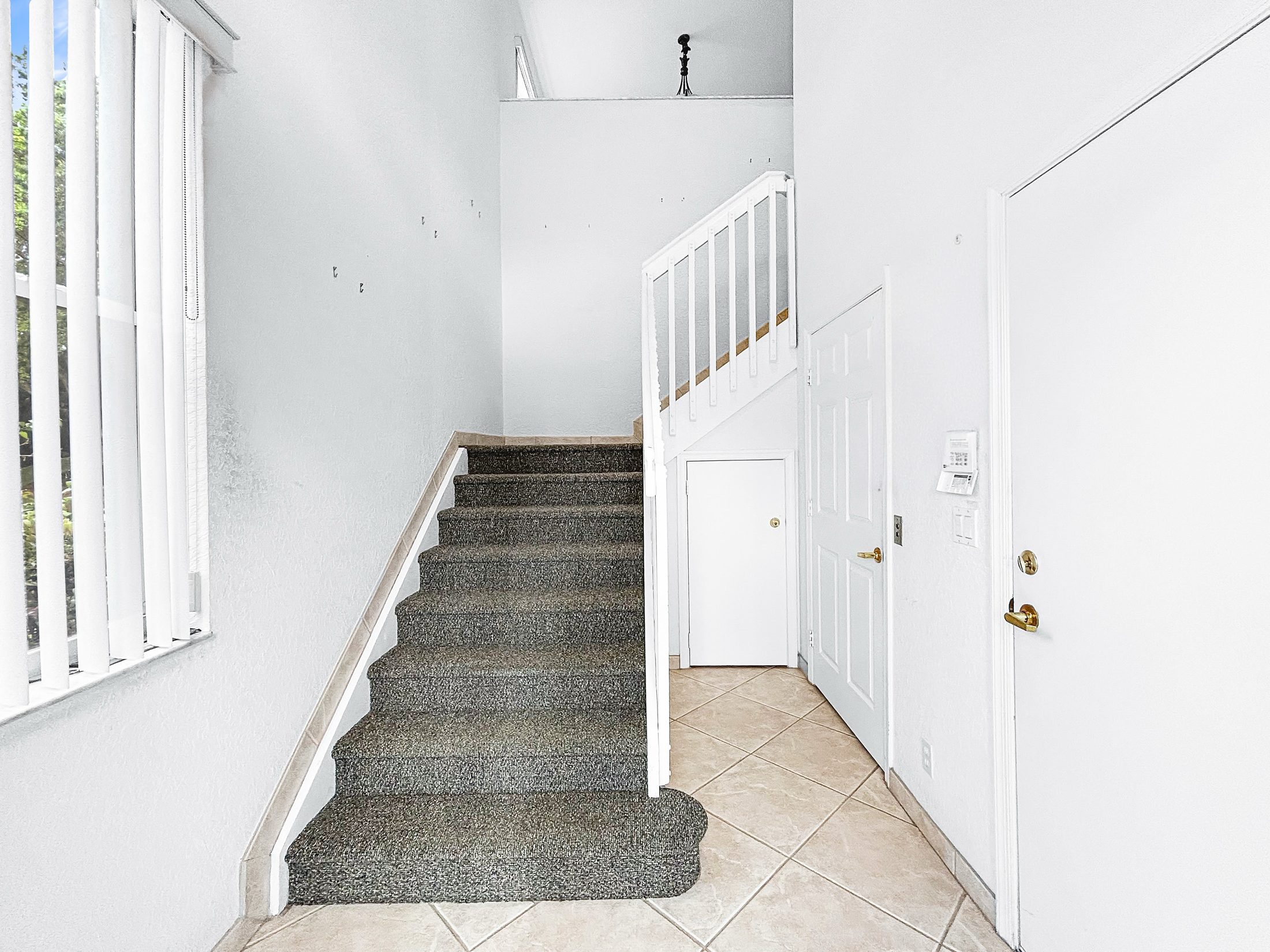 7880 Laina Lane #3 Boynton Beach — staircase to main living level