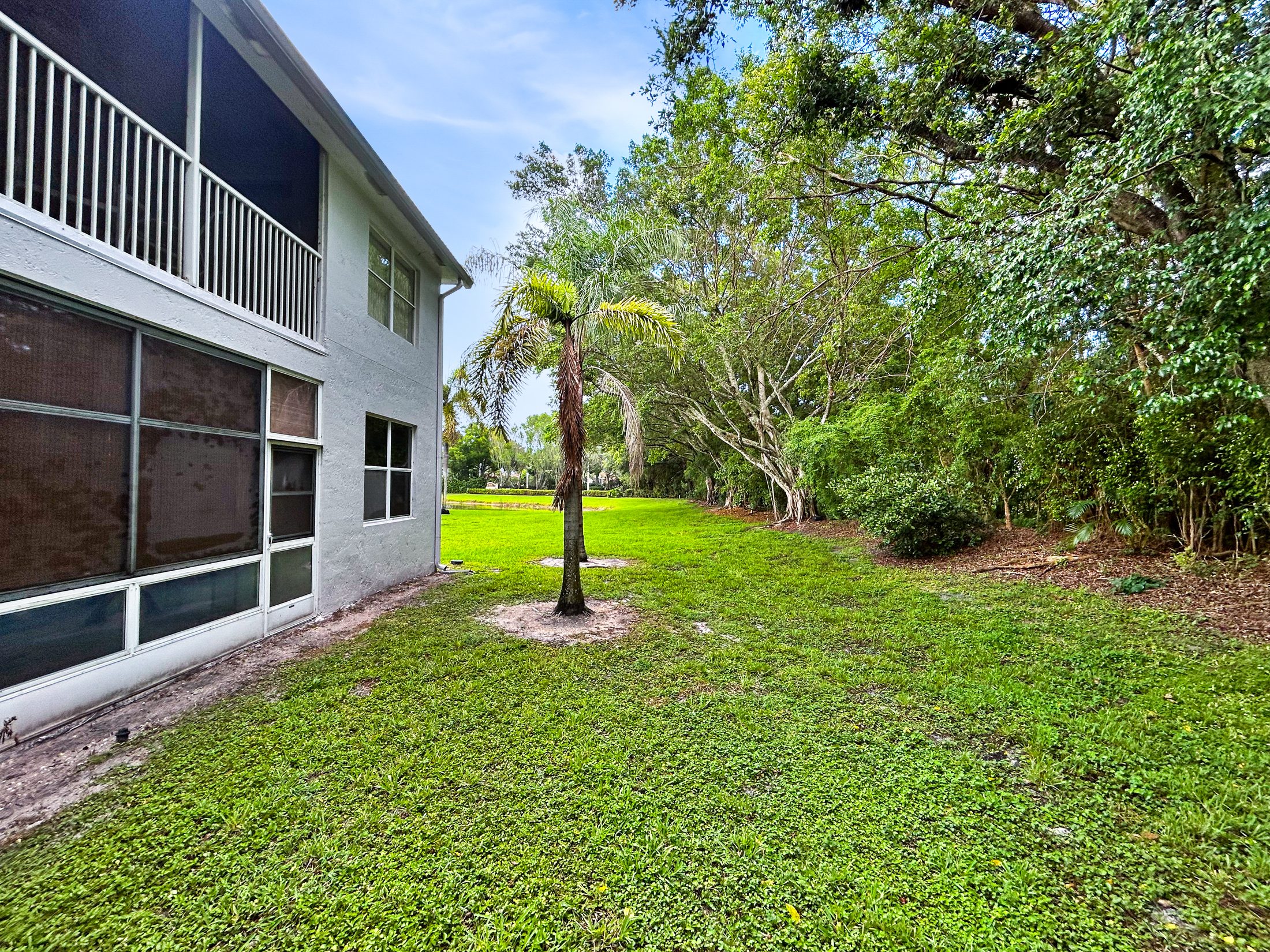 7880 Laina Lane #3 — screened balcony exterior view
