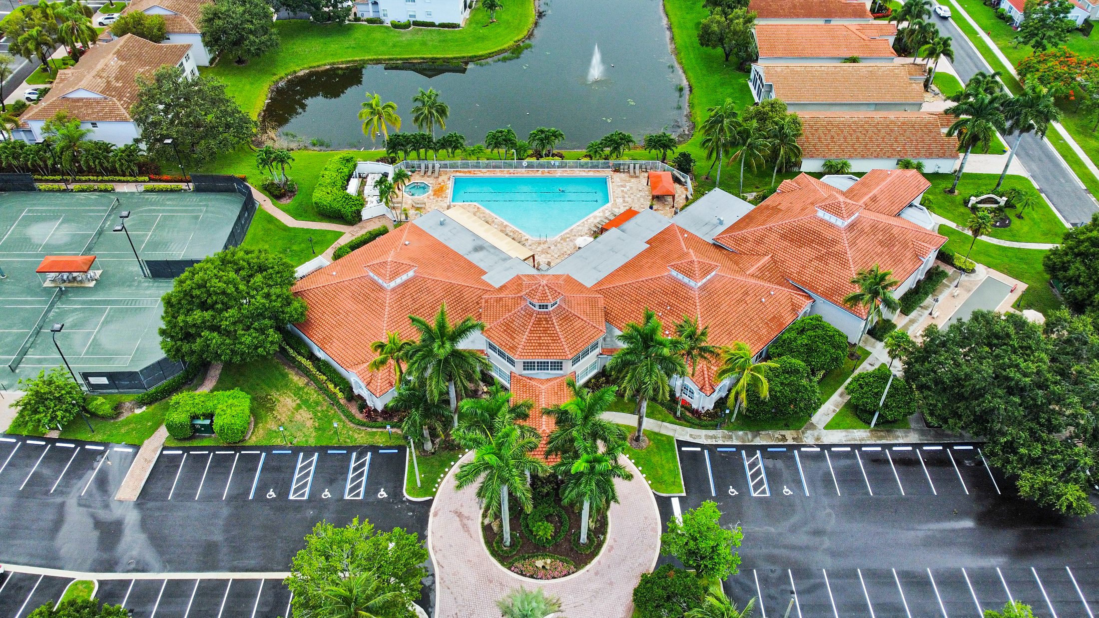 Grove Village community aerial — pool and tennis courts, different angle