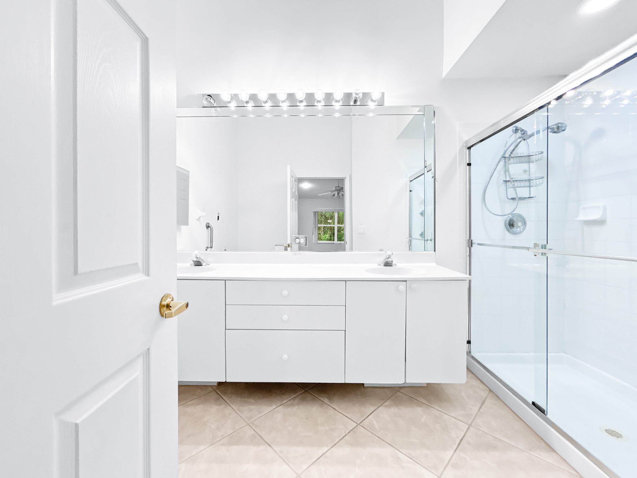 7880 Laina Lane #3 — primary bathroom with glass walk-in shower