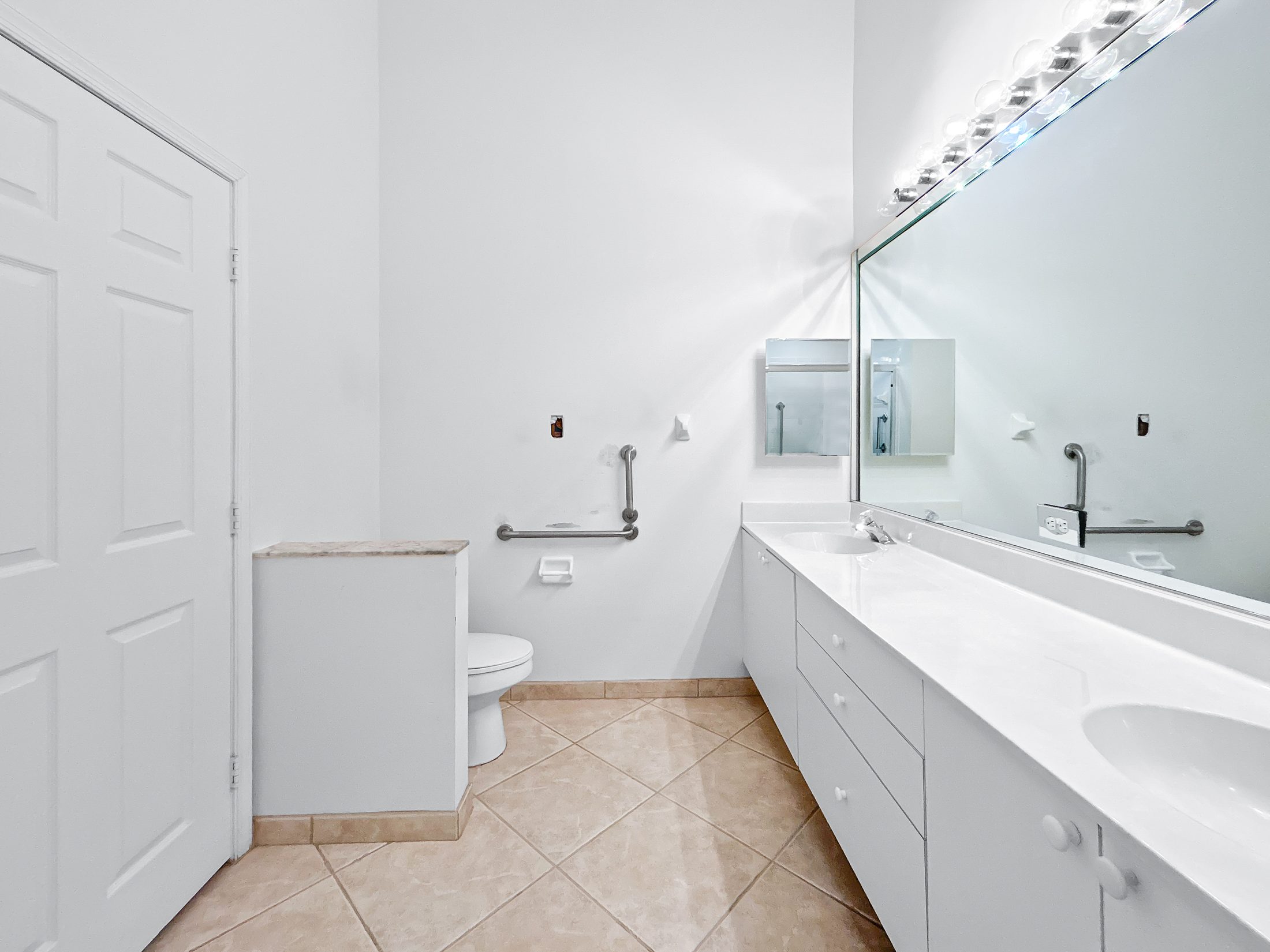 7880 Laina Lane #3 — primary bathroom dual-sink vanity