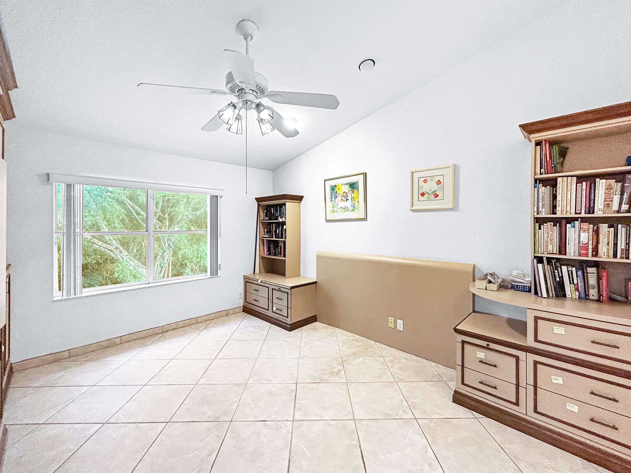 7880 Laina Lane #3 — den with built-in bookshelf
